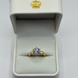 Radiant Gold and Silver Solitaire Ring